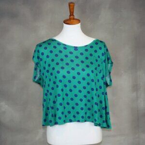 NWOT Eage crop top with a split back L